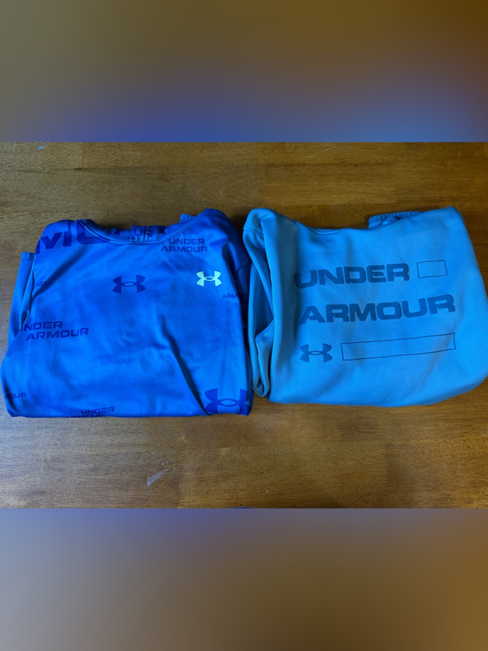 Two youth under armour hoodies